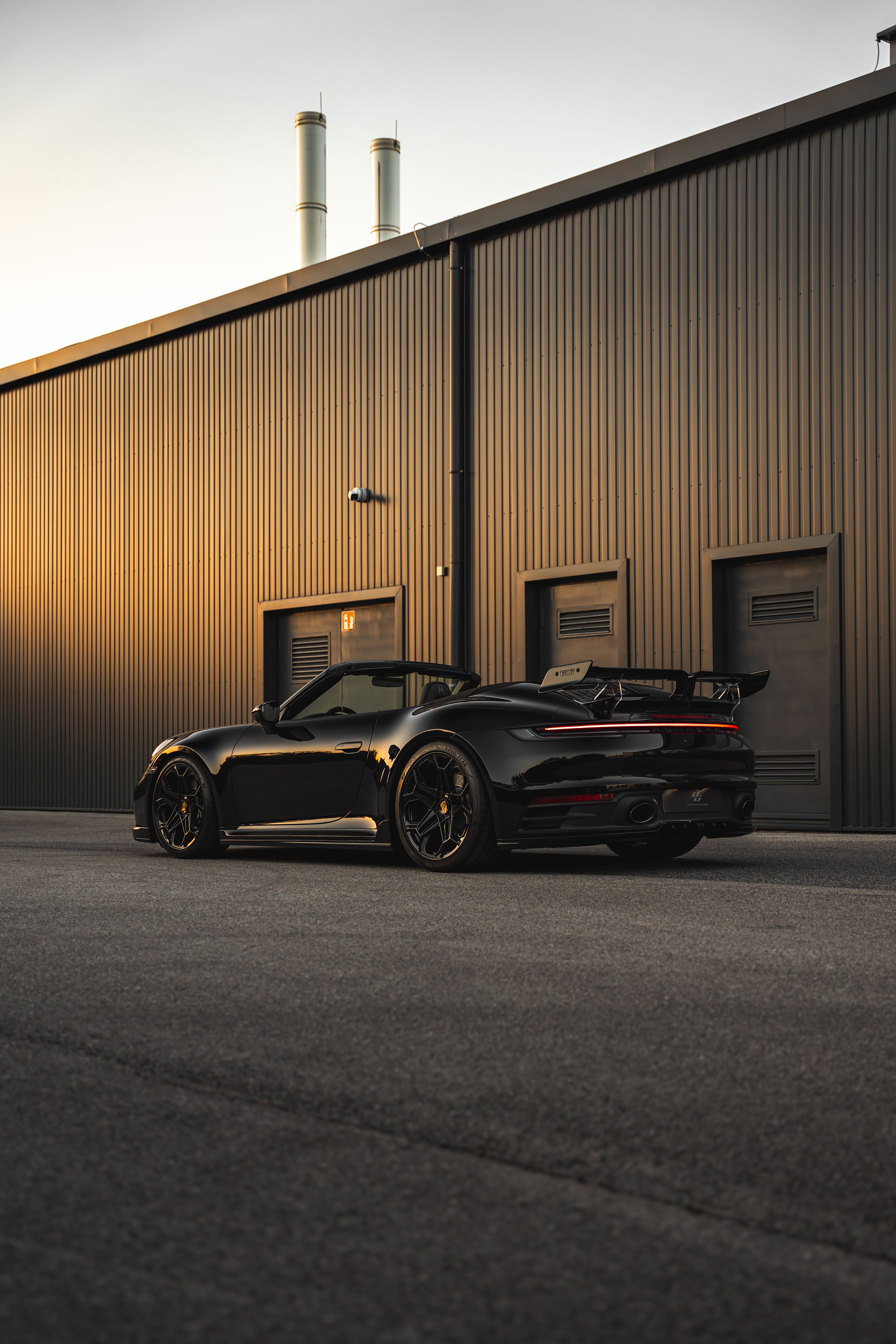 Porsche 992 TechArt rear view outside the hall — Ultimate Garage