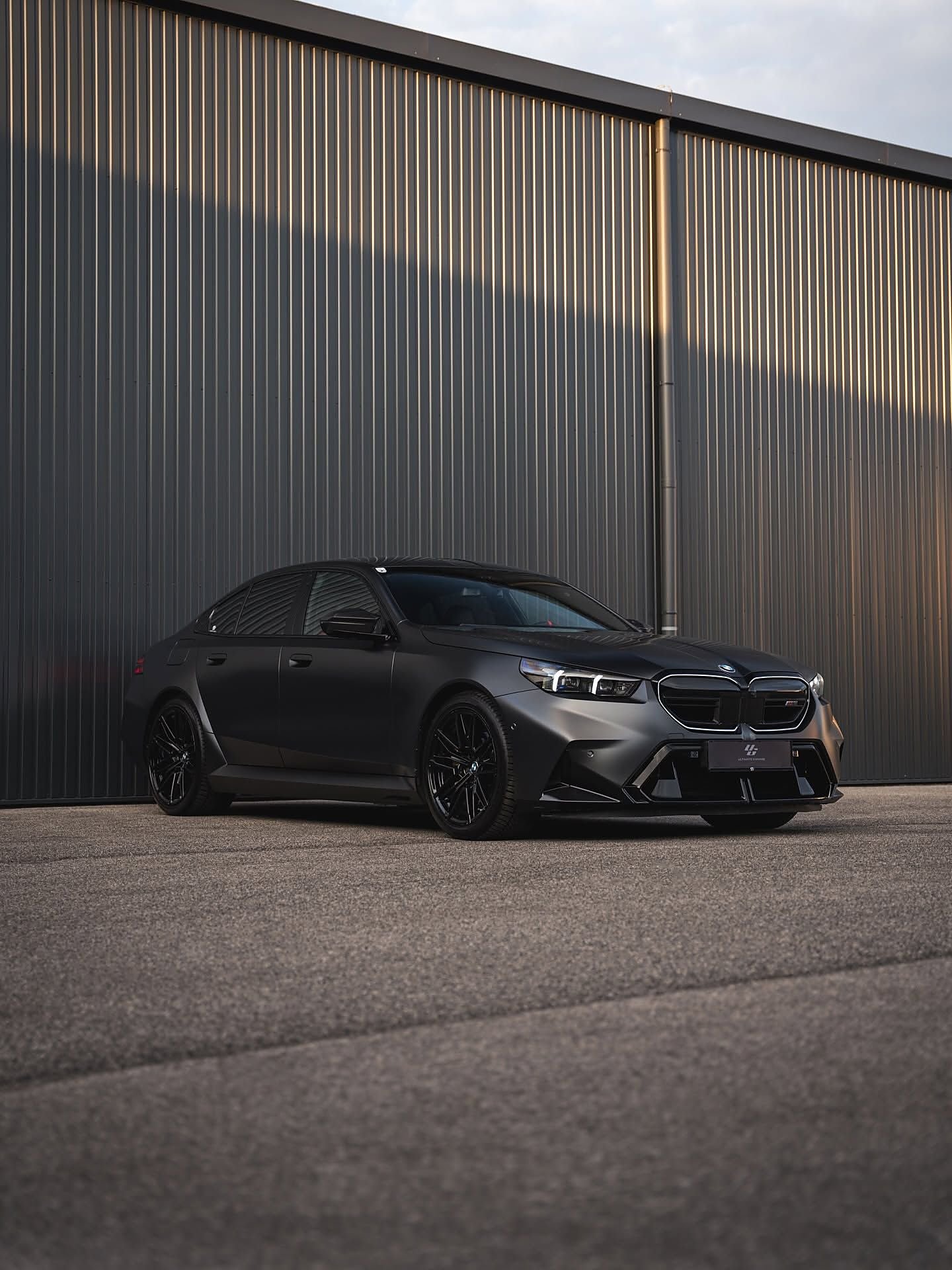 BMW M5 staged in the Ultimate Garage showroom
